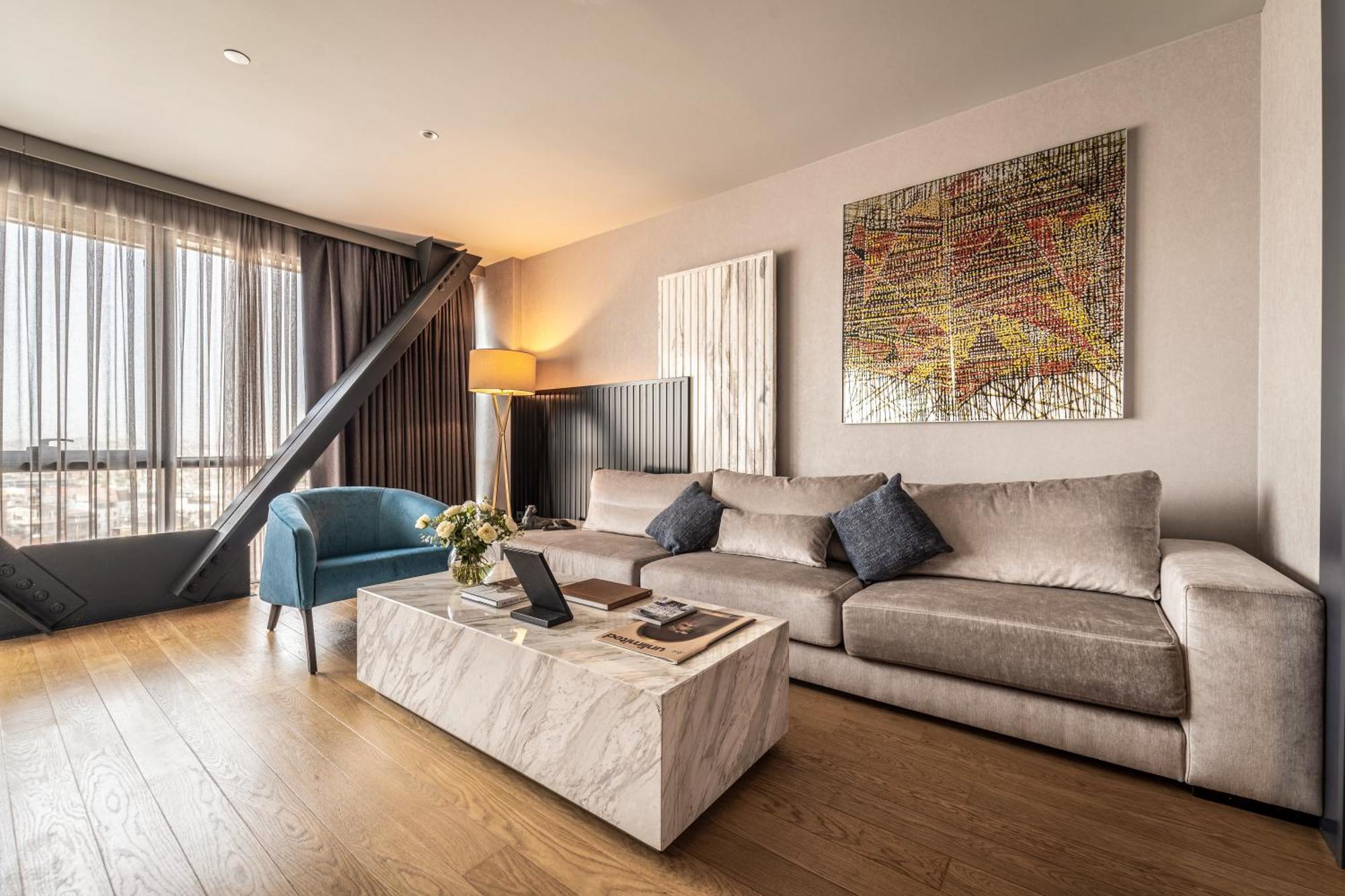 Hotel Sofitel Istanbul Taksim Exteriér fotografie A living room in a penthouse apartment