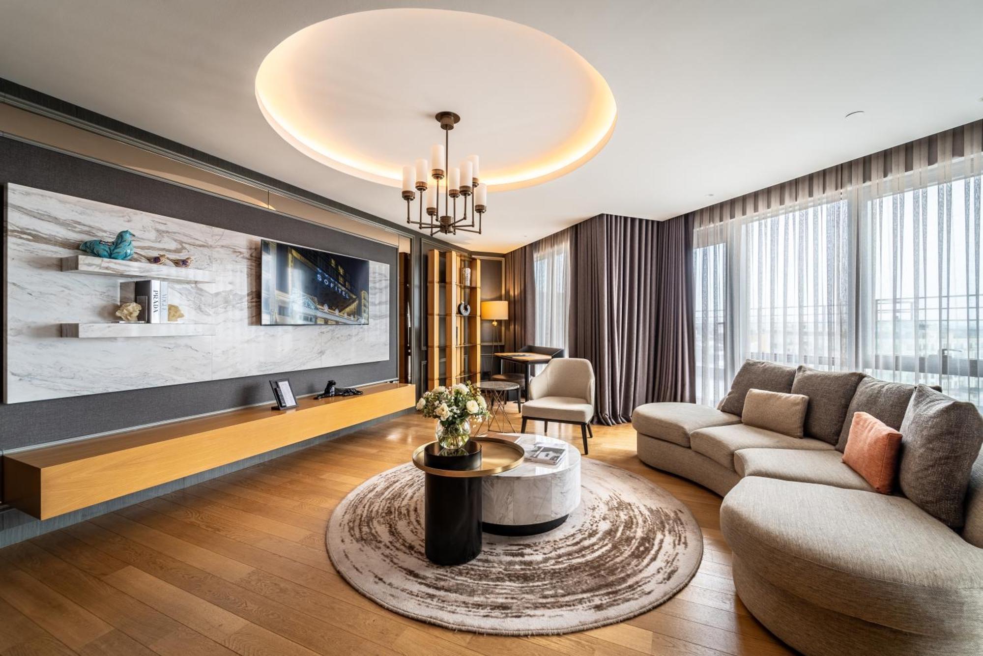 Hotel Sofitel Istanbul Taksim Exteriér fotografie A living room in a luxury apartment